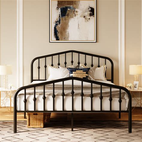 old style wooden bed frame with black metal brackets|fordingbridge metal bed.